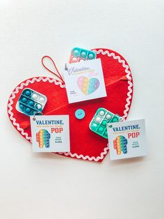 valentine's day gift idea for kids with legos and buttons on red heart