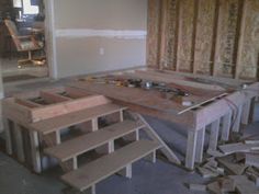 the room is being built and ready to be used as a dining table or bench