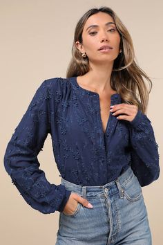 Looking for a chic option for everyday wear? We can't get enough of the Lulus Contemporary Flirt Navy Blue Embroidered Balloon Sleeve Top! Lightweight woven fabric boasts an embroidered floral design with 3D applique accents throughout. Long balloon sleeves with button cuffs frame a bodice with a crew neckline and a functional button placket at the front. Rounded hems complete the look. Fit: This garment fits true to size. Length: Size medium measures 22.5" from shoulder to hem. Bust: Great for Floral Embroidery Blouse For Work, Floral Embroidered Top For Workwear, Chic Embroidered Tops For Work, Blue Blouse With Geometric Embroidery For Spring, Chic Embroidered Workwear Tops, Spring Blue Geometric Embroidered Blouse, Embroidered Blouse For Work, Chic Long Sleeve Embroidered Cotton Top, Chic Long Sleeve Floral Embroidered Top