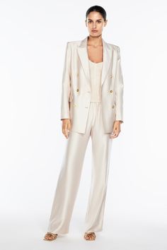 The Neutral Stance Blazer is a lightweight, elegant & easy to wear tailored blazer with a silk like finish. Pair it back with the matching pants for a coordinated outfit or with jeans to opt for a more relaxed look. Luxe details such as gold tone hardware bringing elegance and luxury together. Please refer to the studio imagery for the accurate representation of garment colour. Style Number: 20634.CRM Blazer Beige, Tailored Blazer, Matching Pants, Modern Elegance, The Studio, Modern Luxury, Double Breasted, The Future, Sense