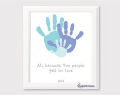 a blue handprinted card with the words, all because two people fell in love