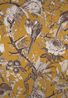 a yellow wallpaper with birds and flowers on it