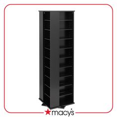 a tall black bookcase with shelves on the bottom and bottom, against a white background