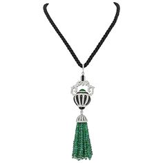 This fine 18k white gold necklace on a black cord features all natural emerald beads, diamonds and onyx accents made in a shape of a tassel. Styled in Art Deco fashion this tassel necklace is in excellent condition. Measures about 4 inches long, with the cord about 20 inches. Diamond Carat Weight: 10.00cts (approx.) Quality: G-H color, VS-SI clarity. Ben Amun Necklace, Stile Art, Mens Diamond Jewelry, White Gold Necklace, Emerald Bead, Onyx Necklace, Tassel Jewelry, Art Deco Necklace, Emerald Pendant