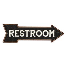 a black and white arrow sign that says rest room on it's left side