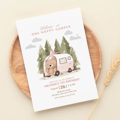 a birthday card with an image of a camper and a bear on the front