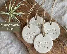 three ceramic ornaments that say, customize me with love and when i love you