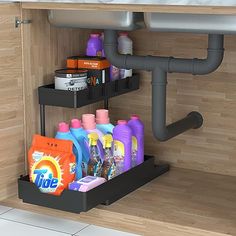 the under sink shelf is filled with cleaning products