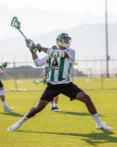 a lacrosse player in action on the field