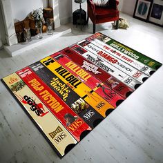 an area rug with various movie posters on it