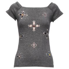 CHANEL silver tone CC logo colorful gems Byzantine Cross embellished top FR36 S Reference: TGAS/D00297 Brand: Chanel Designer: Karl Lagerfeld Material: Cotton, Polyamide, Elastane Color: Silver, Multicolour Pattern: Solid Closure: Pullover Extra Details: CC logo button at near hem at front left side. Made in: Italy CONDITION: Condition: Excellent, this item was pre-owned and is in excellent condition. Comes with: Style code present (Generic) SIZING Designer size: FR36 Size reference: US2-4 / UK8 / IT40 / FR36 / XS-S MEASUREMENTS: Neck to sleeve: 13cm / 5.1" Chest: 35cm / 13.7" Waist: 29cm / 11.3" Length: 55cm / 21.5" This Chanel item is authentic. Byzantine Cross, Chanel Designer, Embellished Top, Cc Logo, Karl Lagerfeld, Silver Tone, Shirt Blouses, Chanel, In Italy