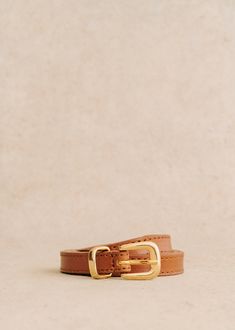 Belt;Made in our Italian atelier;Hip belt;Smooth vegetable-tanned cowhide leather exterior;Buckle fastening, aged gold finish Hip Belt, Natural Heritage, Vegetable Tanned Leather, Parisian Style, Cowhide Leather, Tan Leather, Gold Finish, Buckle, My Style