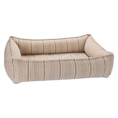 a dog bed that is made out of fabric and has stripes on the bottom half