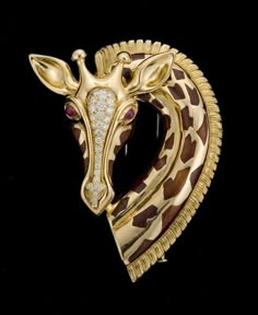 18 karat gold, diamond, ruby and enamel brooch - pin - one-of-two-made - by Albert Lipten, of New York in the form of a giraffe with a diamond head and pear shaped ruby eyes, with different tones of brown enamel. Figural Jewelry, Diamond Head, A Giraffe, Enamel Brooch, Vintage Jewels, American Jewelry, Animal Jewelry, High Jewelry