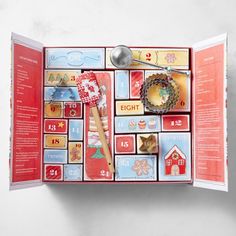 an open children's book with pictures and magnets