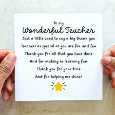 two hands holding up a card that says, to my wonderful teacher just a little card to say a big thank you