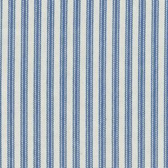 the blue and white striped fabric is very close to it's surface, with vertical stripes