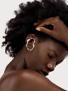 Ohiri Outlines Earcuff – Industrie Africa Elegant Metal Single Ear Cuff, Luxury Gold Ear Cuff, Luxury Sterling Silver Single Ear Cuff, Modern Single Ear Cuff For Evening, Elegant Metal Pierced Ear Cuff, Elegant Pierced Brass Ear Cuff, Elegant Gold Plated Silver Ear Cuff, Luxury Silver Single Ear Cuff, Luxury Formal Pierced Ear Cuff