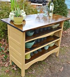 a kitchen island made out of an old dresser