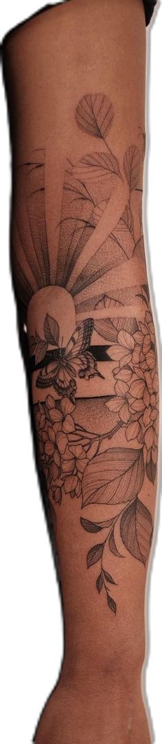 a woman's thigh with flowers on it