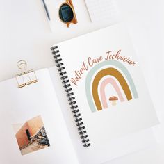 an open notebook with the words thoughts on it next to photos and pen, sunglasses