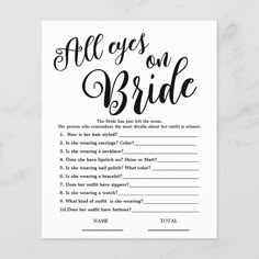 an all eyes on the bride game card with question marks in black and white ink