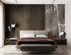 a modern bedroom with marble walls and wood paneling, along with a large bed