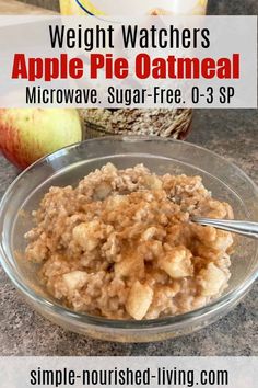 an apple pie oatmeal is in a glass bowl