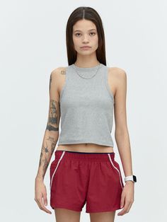 This is a trendy and casual top by MENASOO that is made out of high quality and sturdy material. With distinctive mood of the design and comfortable wear, you can style it for your casual daily outfit.- Fabric with excellent shape retention- Detachable bra caps for easy wash- Sporty and casual mood Gray Athleisure Crop Top For Summer, Versatile Gray Workout Top, Versatile Gray Sports Top, Casual Gray Crop Top For Sports, Trendy Heather Grey Tops For Streetwear, Trendy Heather Grey Top For Streetwear, Trendy Heather Grey Streetwear Tops, Sporty Gray Stretch Crop Top, Basic Gray Stretch Tank Top