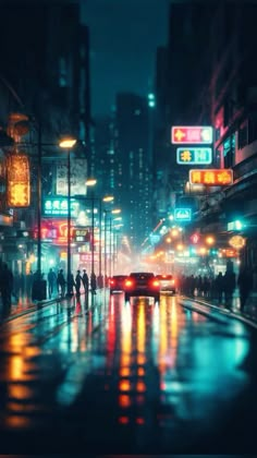 a car driving down a city street at night