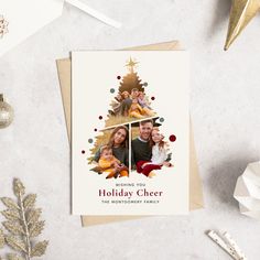 a christmas card with an image of a family on it