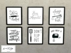 four black and white prints with kitchen sayings on them, hanging on a wall