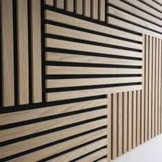 a wooden wall with black and white lines on it