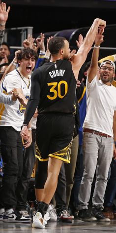 the basketball players are celebrating their team's victory