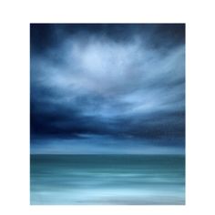 an ocean scene with dark clouds and blue water