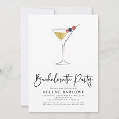 a white card with a martini glass on it and the words bachelor party written in black ink