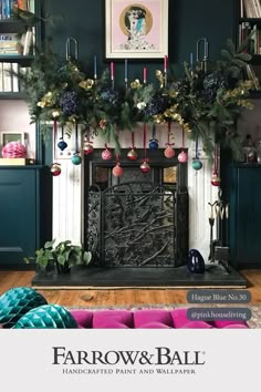 a living room with a fireplace decorated for christmas