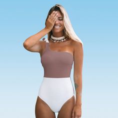 Show off your curves in this coffee and white color block one piece. Adjustable one shoulder strap for the perfect fit with paded cups for light suppport. Get ready to soak up the sun in style.Product Code: ADK4013A Size: large. Gender: female. Age Group: adult. Material: Polyester. One Piece Bathing Suits For Teenagers, Cheap Fitted Swimwear With Bra Friendly Design, Casual Brown Swimwear At Affordable Prices, Cheap Fitted Bodysuit For Beach, Teen One Piece Swimwear, Teen Swimsuits One Piece, Women’s Bathing Suit, Cute One Piece Bathing Suits Modest, Best Bathing Suits For Women Over 40