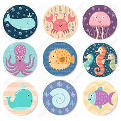 a set of nine different sea animals on circular magnets with blue, pink and green colors