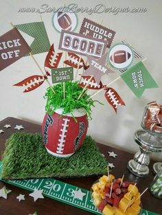 a football themed centerpiece on a table