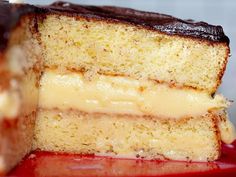 two slices of cake sitting on top of a red plate