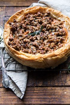 a pie sitting on top of a wooden table