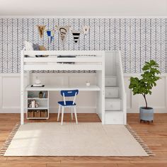 a white loft bed with stairs and desk in front of it on top of a wooden floor