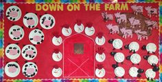 a red bulletin board with farm animals and cows on it's sides that says down on the farm