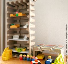 there is a shelf that has some toys on it