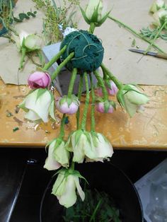 the flowers are being prepared to be cut