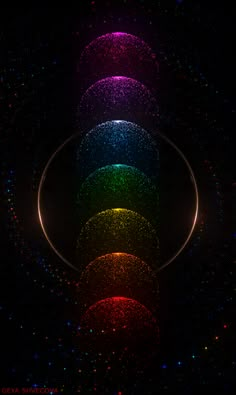 an image of a multicolored background with circles in the center and stars all around it