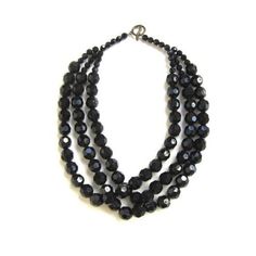 This midnight black necklace is hand-beaded by members of an indigenous tribe in Sarawak. It goes as beautifully with casual wear as it does with the glitz and glamour of an evening gown. Your purchase helps support the artisans. Black Necklace Statement, Glitz And Glamour, Wedding Jewellery Necklace, Black Necklace, Wedding Necklaces, Midnight Black, Hand Beading, Wedding Necklace, Evening Gown