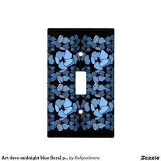 a light switch cover with blue flowers on it