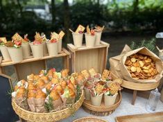 a table topped with baskets filled with food